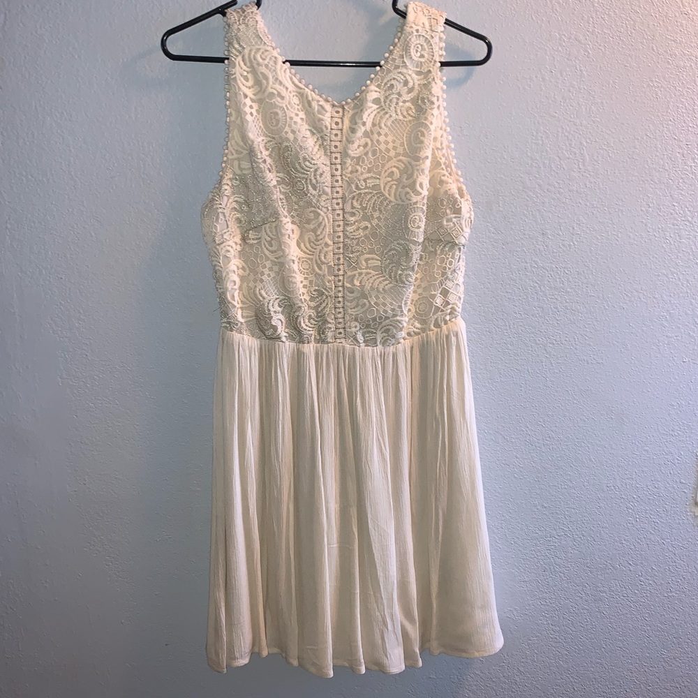 Beautiful designed cream lace low back dress